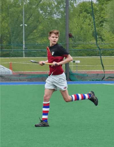 A student playing lacrosse at Cambridge University A student playing lacrosse at Cambridge University