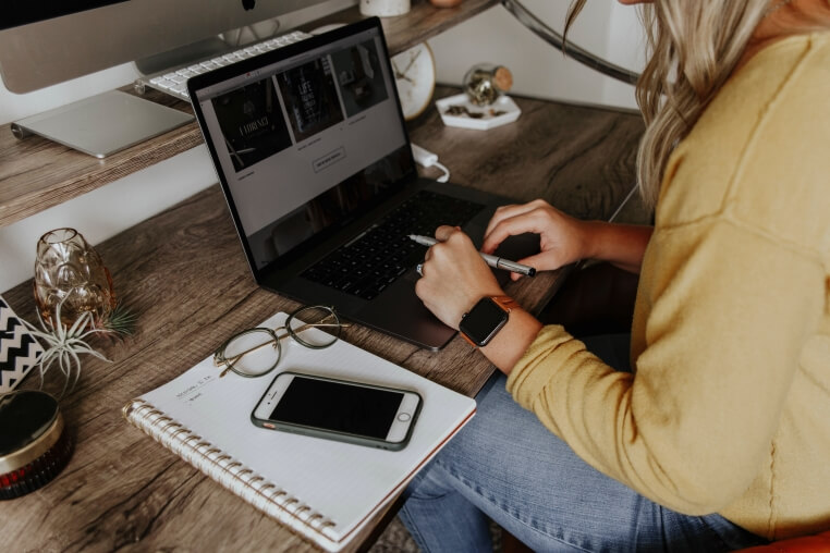 A young girl studying at home online A young girl studying at home online
