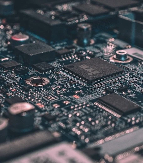A computer chip from our Oxford technology course Close up photograph of a computer circuit board