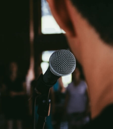 A student speaking at the Graduation Ceremony at an Oxford Scholastica summmer school.