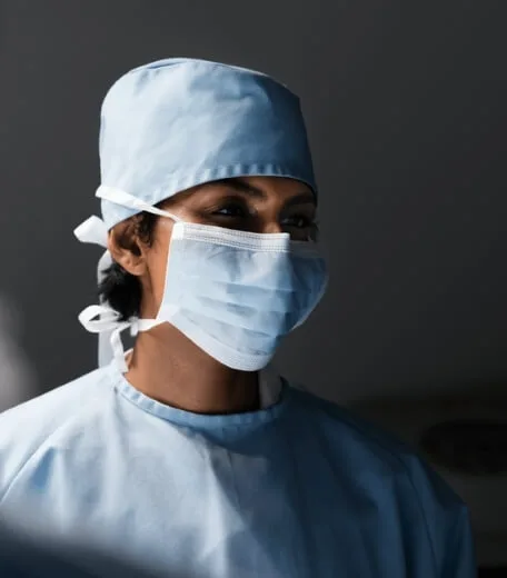 A doctor in scrubs.