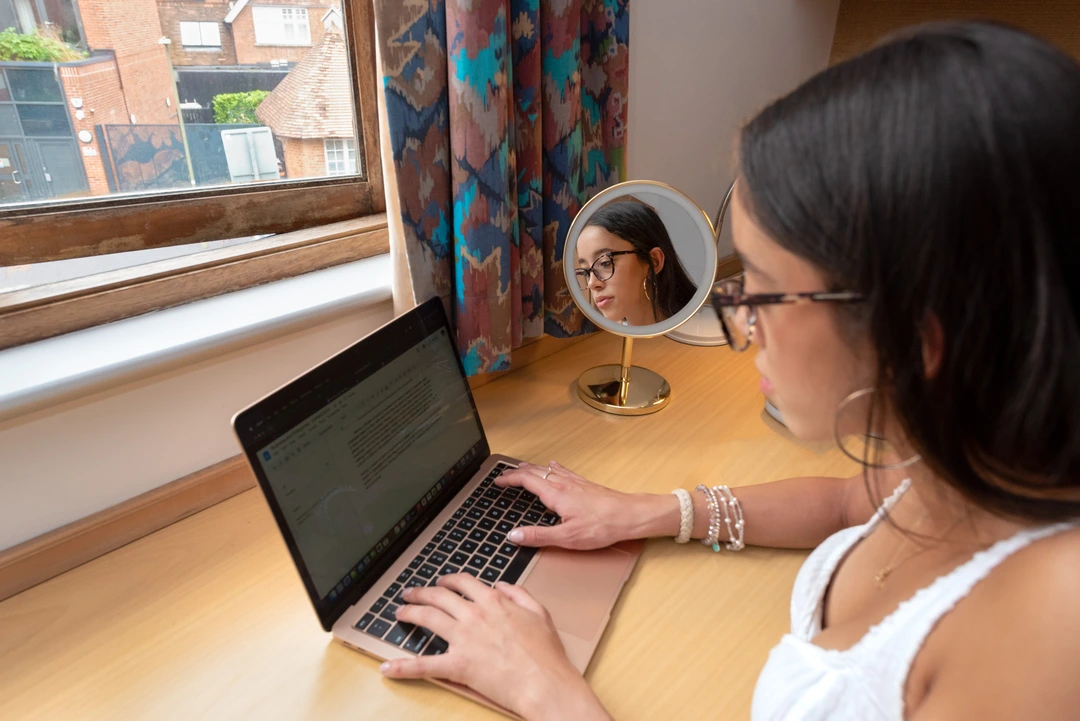 Online student working on their laptop