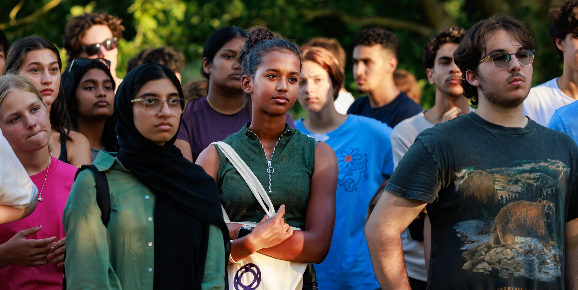 Group of teenagers looking into the distance